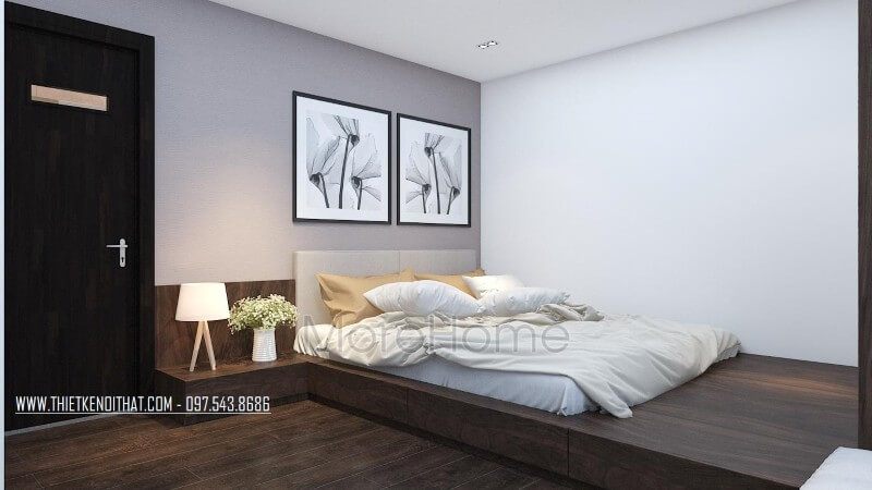 Thay vì sử dụng mảng tường đơn sắc, kiến trúc sư lựa chọn tô điểm thêm cho không gian đầu giường thêm ấn tượng với tranh treo tường canvas tinh tế